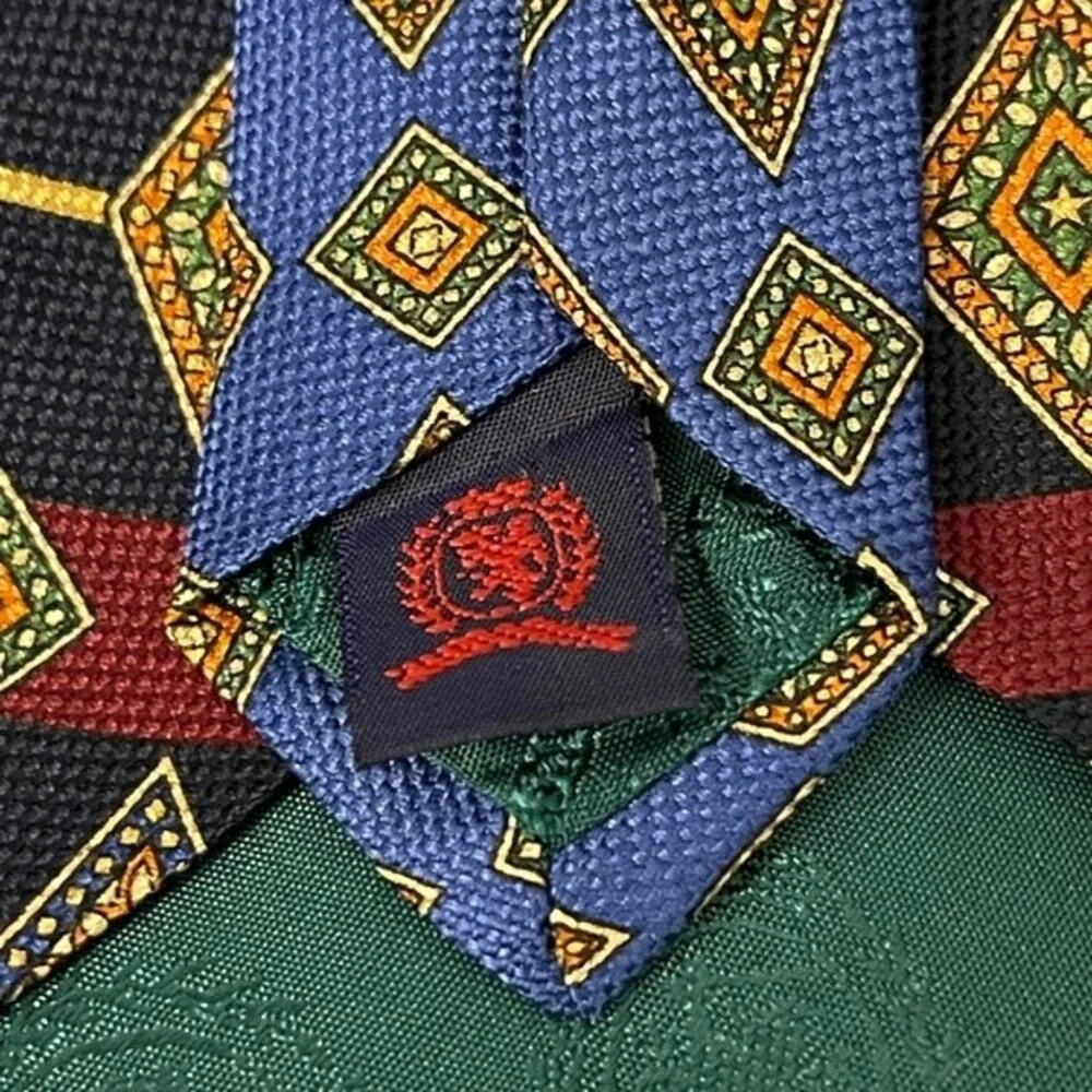 Tommy Hilfiger Tie.Diamond Pattern w/ Red and Blue Stripes.Imported Italian Silk